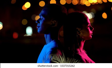 Boy Illuminated By Blue, Girl In Pink Light At Night, Concept Of Man Vs Woman