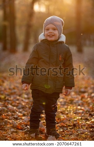 Similar – Image, Stock Photo Cute baby seeing falling leaves