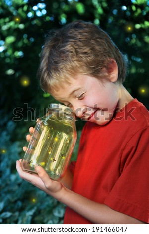 Boy with a jar of fireflies