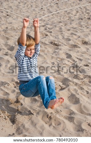 Similar – Foto Bild Kind spielt mit Sand auf den Dünen