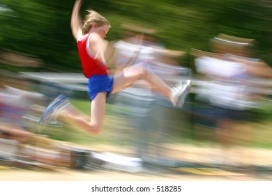 Boy Jumping At Track Meet