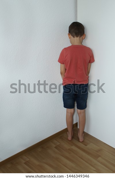 Standing on the corner. Kid Stand in Corner Punished. Corner punishment. The child Stands in the Corner as a punishment. Meme standing on the Corner.