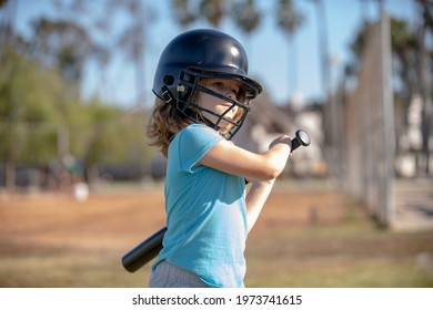 Boy Kid Holding A Baseball Bat. Pitcher Child About To Throw In Youth Baseball.