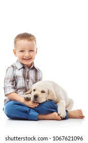 Boy With A Labrador Puppy, Isolated On White