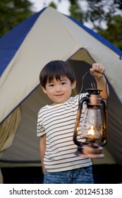 The boy with a lantern