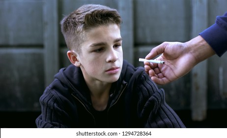 Boy Learning To Smoke With Older Friend, Bad Influence Of Street Life, Addiction