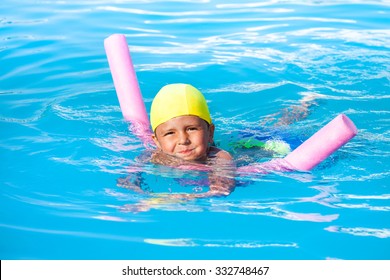 Boy Learns Swimming Alone With Pool Noodle