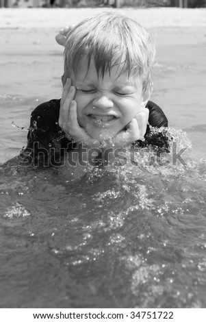 Similar – photo of an adorable boy learning to swim