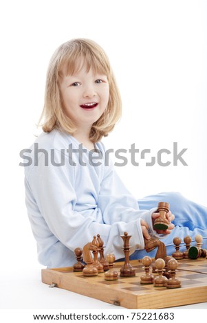 Similar – lifestyle shot of smart kid girl playing checkers at home