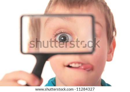 Similar – Child with reading magnifier