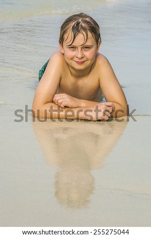 Similar – Image, Stock Photo Little boy doing exercise at beach