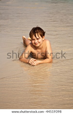 Similar – Image, Stock Photo Little boy doing exercise at beach