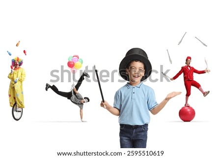 Boy with a magic hat and a group of circus entertainers performing isolated on white background