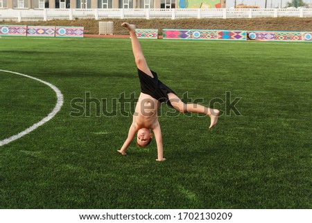 Similar – Image, Stock Photo office worker plays football at the stadium