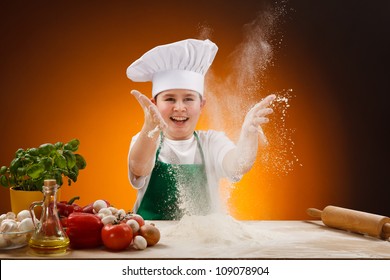 Boy making pizza dough - Powered by Shutterstock