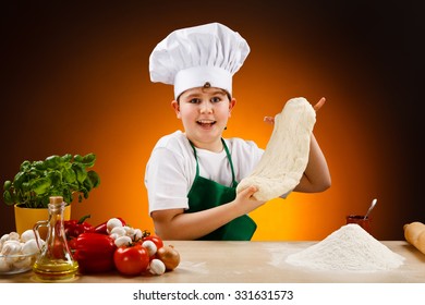 Boy Making Pizza Dough 