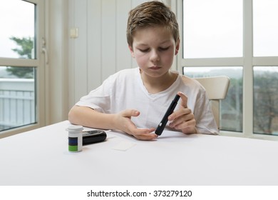 Boy Measure Glucose Or Blood Suger Level