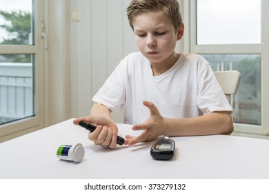 Boy Measure Glucose Or Blood Suger Level