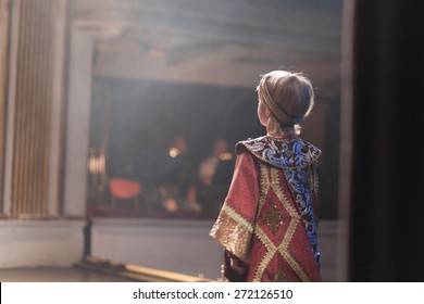 Boy In Medieval Costume Acting 