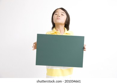 Boy with a message board