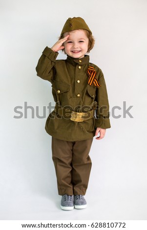boy in military uniform on holiday day of victory, May 9, Russia. Isolated on white background