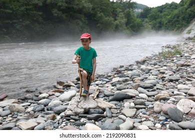 Boy On Bank Of Belaya River, Adygea