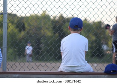 Boy On Baseball Bench