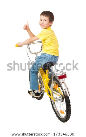 Similar – A funny boy riding his bicycle