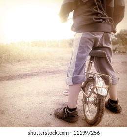 Boy On The Bike In Vintage Style