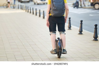 Boy On Electric Unicycle. 