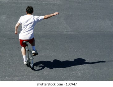 Boy On A Unicycle