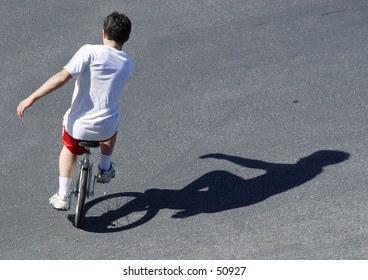 Boy On A Unicycle