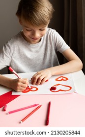 Boy Painting Red Heart Card For Valentines Day On White Table, Crafting, Top View, Copy Space, Love, Valentines Day And Mothers Day Concept, Lifestyle