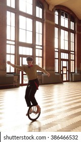 Boy Performing With Unicycle