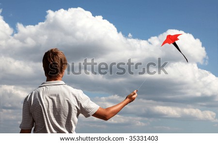 Similar – Image, Stock Photo A red kite flies as an octopus in the sky