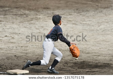 Boy playing baseball