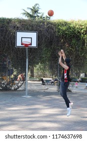 boy playing basket