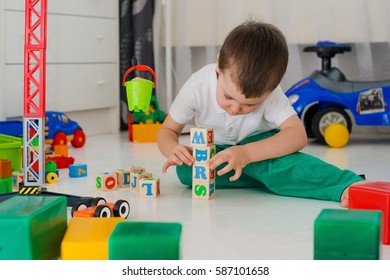 boy playing with blocks