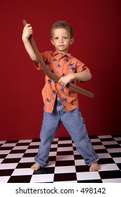 Boy Playing With Boomerang