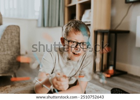 Boy playing buzz wire game