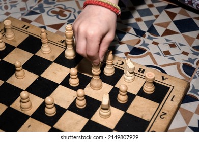 Boy Playing Chess, Hand Close Up.