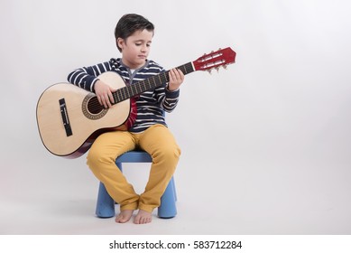 Boy Playing Guitar