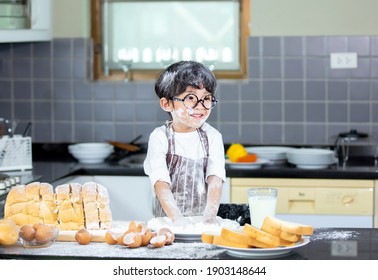 Boy playing naughty in the kitchen