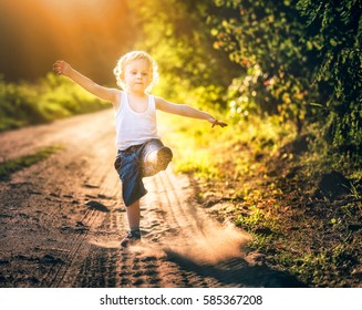 Boy Playing On Country Rural Road Stock Photo 585367208 | Shutterstock