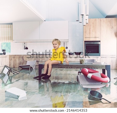 
Boy playing On Table While Flooding in the kitchen. Media and photo combination creative concept 