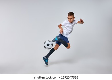 Boy Playing Soccer, Happy Child, Young Male Teenager Enjoying Sports Game, Isolated Portrait, Kids Activities, Little Soccer Player