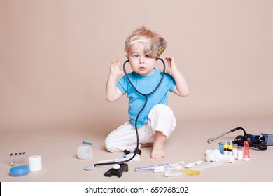 a boy plays in doctor medicine hospital 23