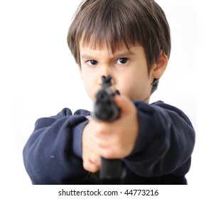  boy pointing gun at camera