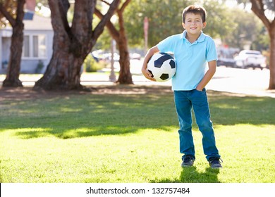 Boy Posing With Soccer Ball