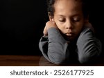 boy in poverty being bullied at school with depression no help crying alone and all by himself on grey background with people stock photo stock image